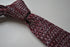 knitted maroon and white speckled ties
