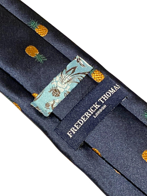 navy tie with pineapple embroidered design