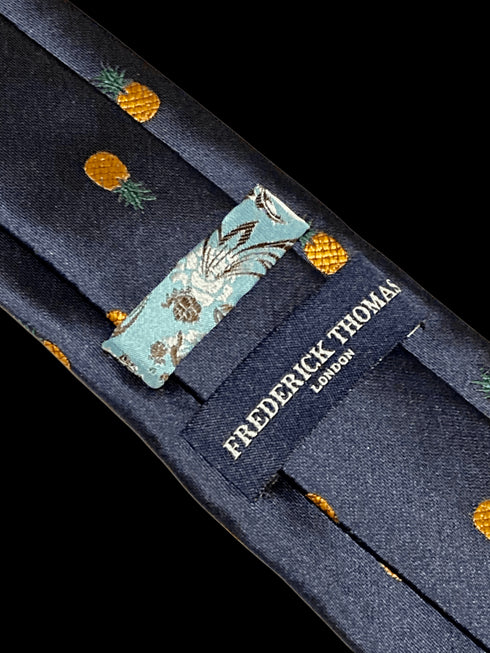 navy tie with pineapple embroidered design