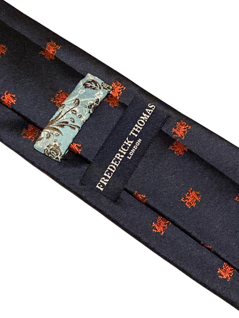 navy tie with embroidered red Welsh dragon design