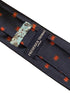 navy tie with embroidered red Welsh dragon design