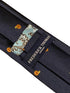 navy tie with embroidered snail design