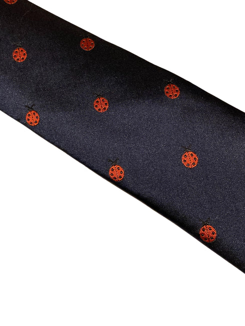 navy tie with embroidered ladybird design