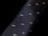 navy tie with embroidered New Zealand feather silver fern design