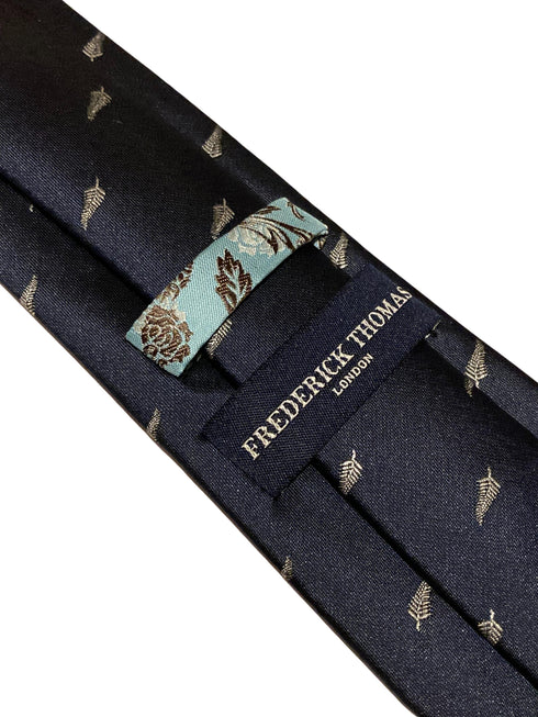 navy tie with embroidered New Zealand feather silver fern design