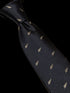 navy tie with embroidered New Zealand feather silver fern design