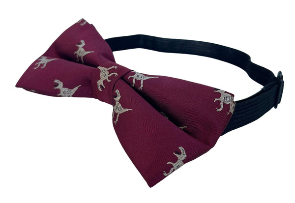 Maroon child's bow tie with t-rex embroidered design