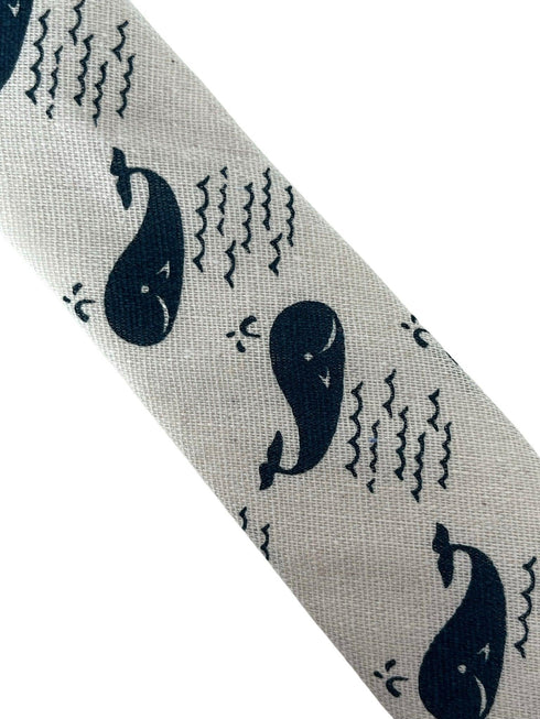 ivory cream cotton tie with blue whale nautical design