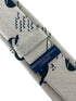 ivory cream cotton tie with blue whale nautical design