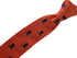 orange knitted tie with embroidered navy skull and crossbone design