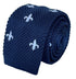 navy blue knitted tie with white embroidered fleur de lis lys design