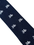 navy blue knitted tie with white embroidered bicycle bike design