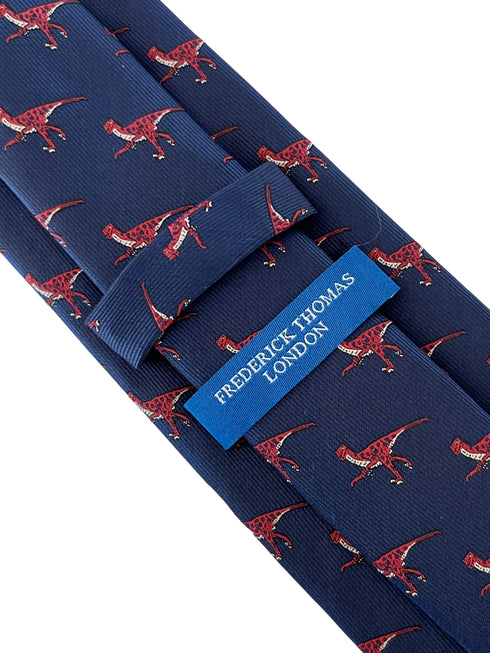 navy blue tie with velociraptor dinosaur design