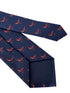 navy blue tie with velociraptor dinosaur design