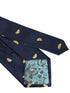 navy blue tie with yellow lemon slice fruit design