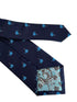 navy blue tie with blue whale design