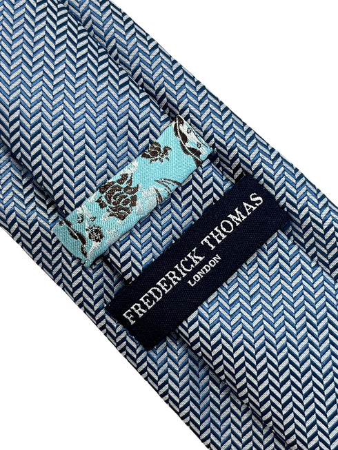 Plain navy blue and white tie with herringbone design