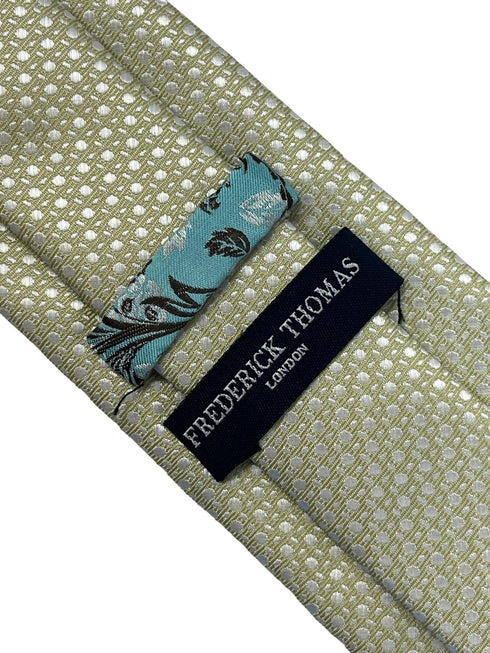 Gold tie with geometric design