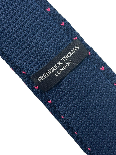 Navy dark blue knitted tie with bright hot pink pin spots