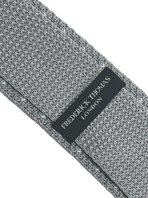 Light silver grey knitted tie with white pin spots