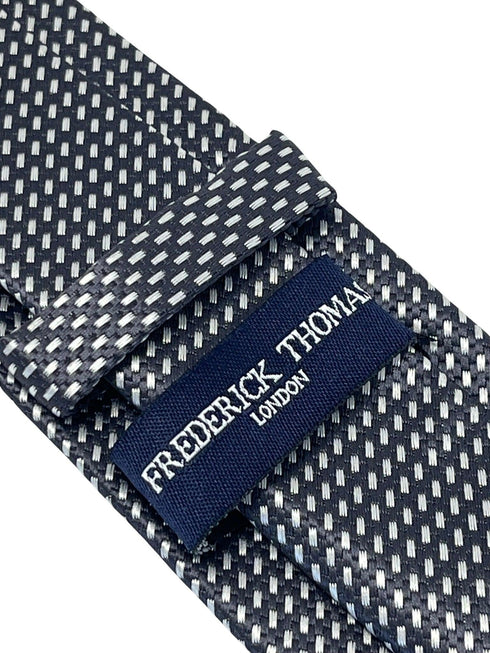 dark grey and white geometric stitch design