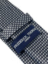 dark grey and white geometric stitch design