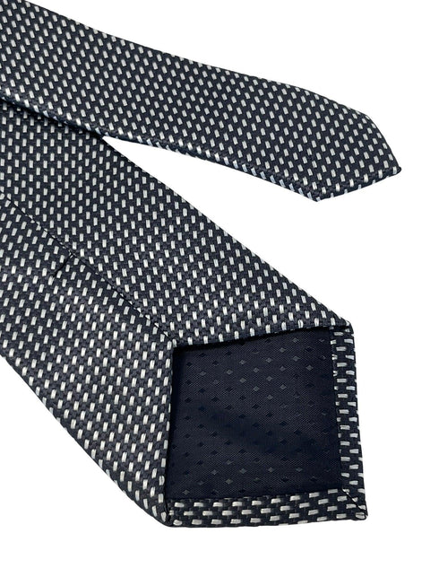 dark grey and white geometric stitch design