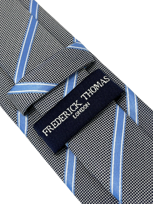 grey tie with light blue thin stripe