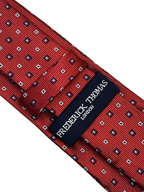 red tie with geometric square design