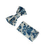 ivory cotton bow tie with blue rose design and matching pocket square