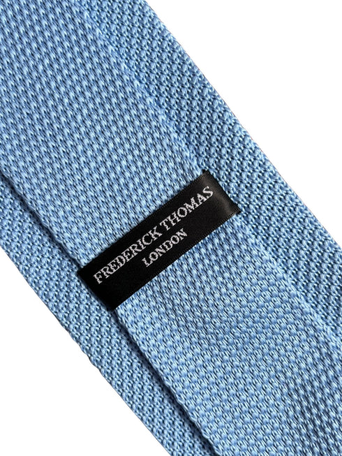 plain pastel cornflower light blue knitted 8cm width tie with pointed end