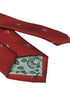 dark red tie with an embroidered deer head design