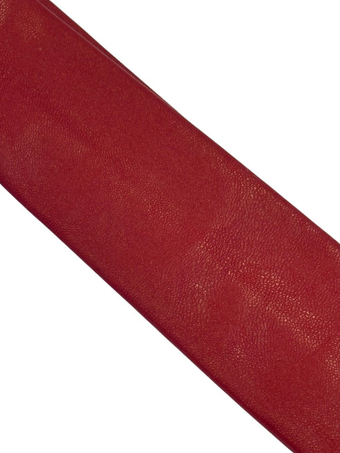 red tie in faux leather style material