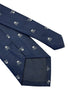 navy blue tie with white skull and crossbone design