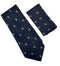 matching navy tie and pocket square with white skull and crossbone design