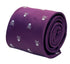 purple tie with white skull and crossbone design
