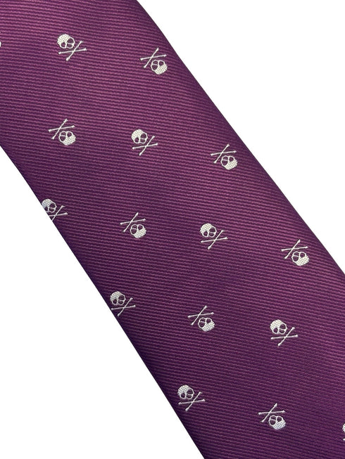 purple tie with white skull and crossbone design