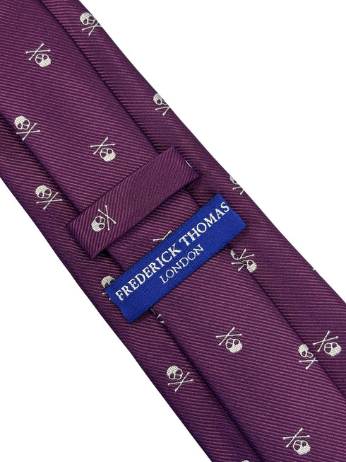 purple tie with white skull and crossbone design