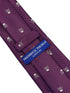 purple tie with white skull and crossbone design
