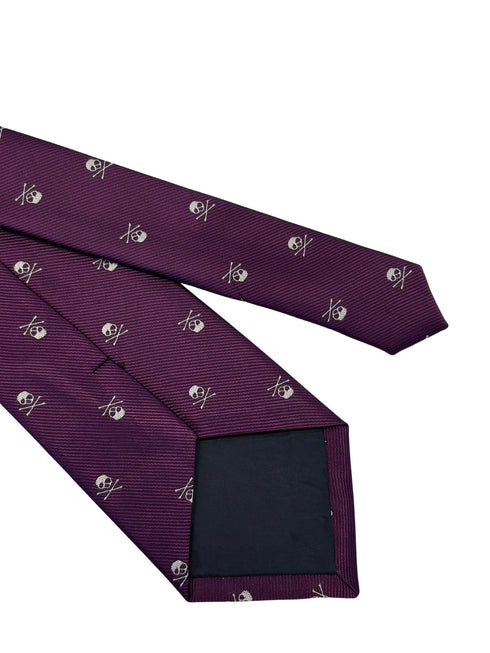 purple tie with white skull and crossbone design
