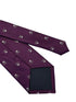purple tie with white skull and crossbone design