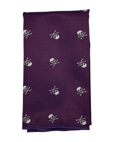 matching purple tie and pocket square with white skull and crossbone design