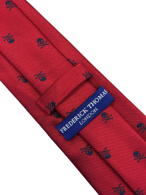 dark red tie with navy blue skull and crossbone design