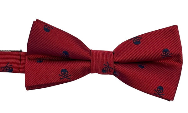 dark red bow tie with navy blue skull and crossbone design