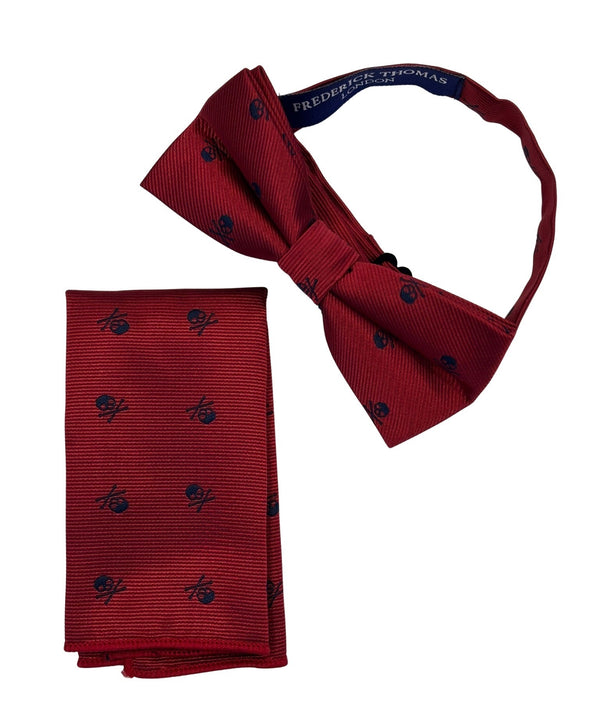 matching dark red bow tie and pocket square with navy blue skull and crossbone design