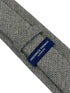 dark grey and cream wool tie with a herringbone design