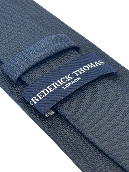 navy dark blue tie with a subtle honeycomb design
