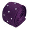 purple knitted tie with white polka spot design