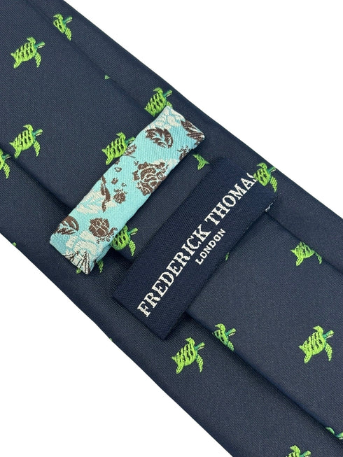 navy dark blue tie with embroidered swimming sea turtle design