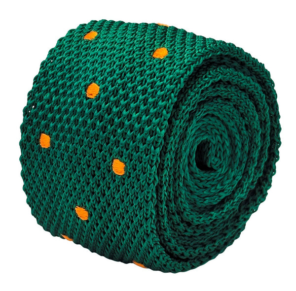 knitted tie in emerald green with an orange polka spots design
